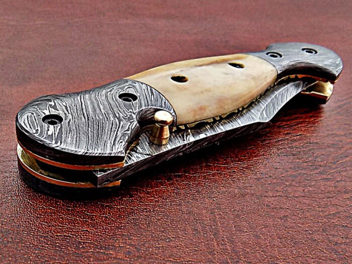 Damascus steel blade folding knife handle material camel Bone